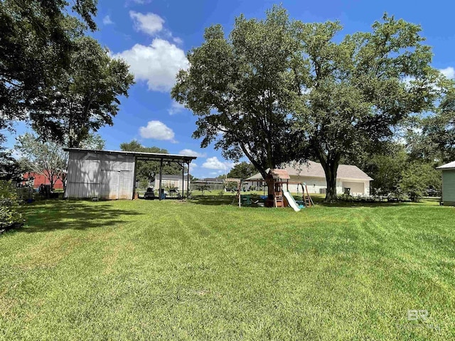 view of yard featuring a playground