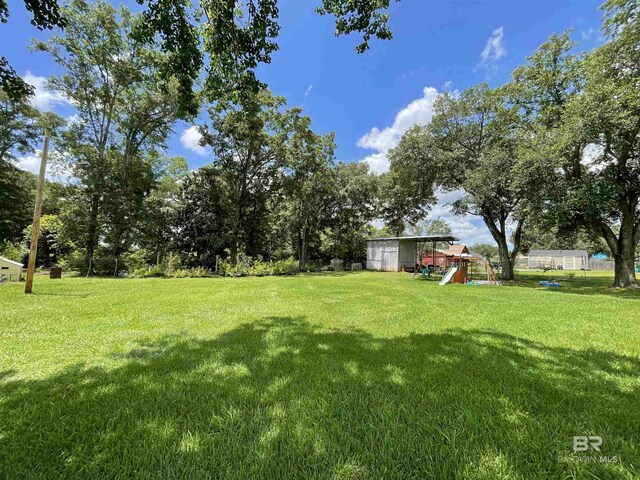 view of yard with a playground