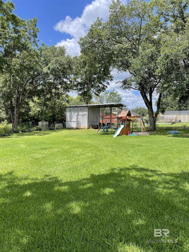 view of yard with a playground