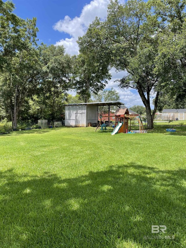 view of yard with a playground