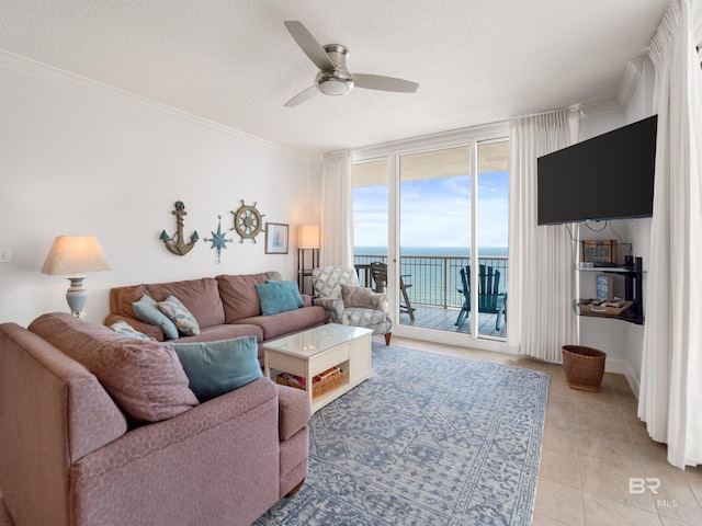 375 Beach Club Trl Unit A1710, Gulf Shores, AL 36542 - living area with ceiling fan, a wall of windows, light tile patterned flooring, crown molding, and a textured ceiling