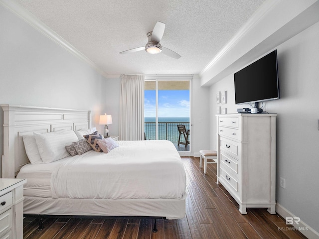 375 Beach Club Trl Unit A1710, Gulf Shores, AL 36542 - bedroom featuring a textured ceiling, ornamental molding, access to exterior, a ceiling fan, and dark wood-style flooring