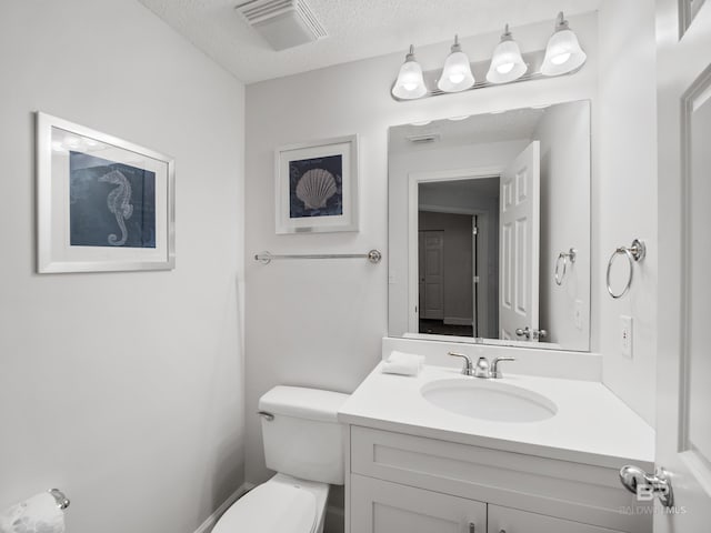 375 Beach Club Trl Unit A1710, Gulf Shores, AL 36542 - bathroom featuring a textured ceiling and vanity