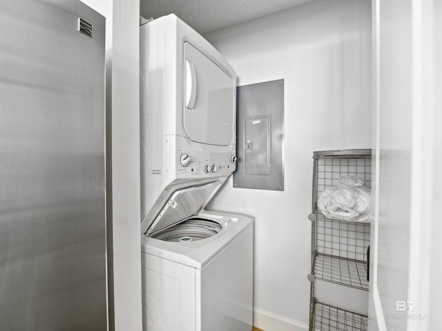 375 Beach Club Trl Unit A1710, Gulf Shores, AL 36542 - laundry room with stacked washer / drying machine and electric panel