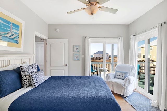 bedroom featuring ceiling fan, light tile flooring, and access to outside