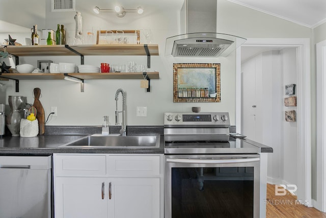 3425 Ponce De Leon Ct, Gulf Shores, AL 36542 - kitchen with visible vents, open shelves, island exhaust hood, a sink, and stainless steel appliances