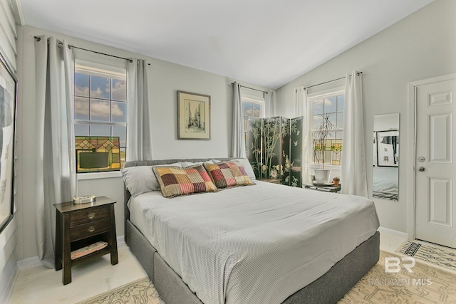 3425 Ponce De Leon Ct, Gulf Shores, AL 36542 - bedroom featuring baseboards and vaulted ceiling