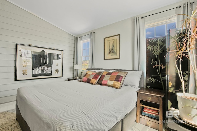 3425 Ponce De Leon Ct, Gulf Shores, AL 36542 - bedroom featuring wood walls and lofted ceiling