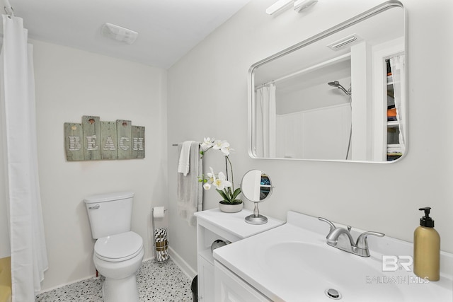 3425 Ponce De Leon Ct, Gulf Shores, AL 36542 - bathroom featuring visible vents, toilet, baseboards, a shower with shower curtain, and speckled floor
