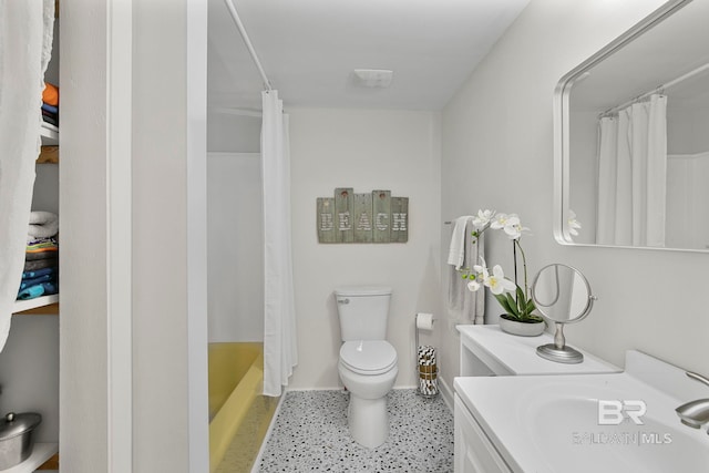 3425 Ponce De Leon Ct, Gulf Shores, AL 36542 - bathroom with vanity, baseboards, toilet, and speckled floor
