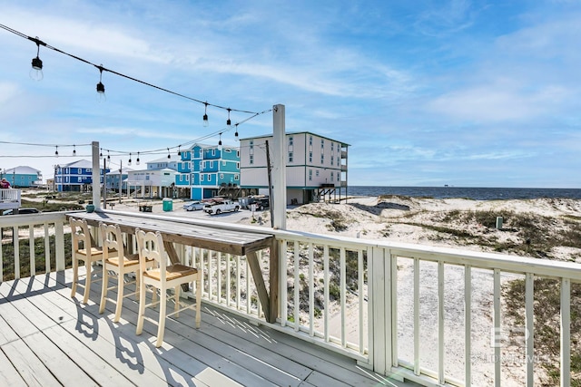 3425 Ponce De Leon Ct, Gulf Shores, AL 36542 - wooden terrace with a beach view and a water view