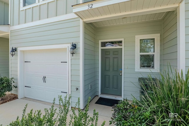 property entrance with a garage