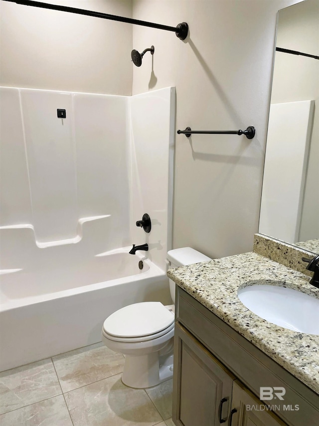 full bath with tile patterned floors, vanity, toilet, and  shower combination