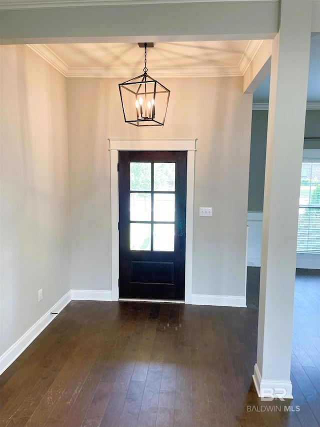 entryway with dark wood-style flooring, a chandelier, and plenty of natural light
