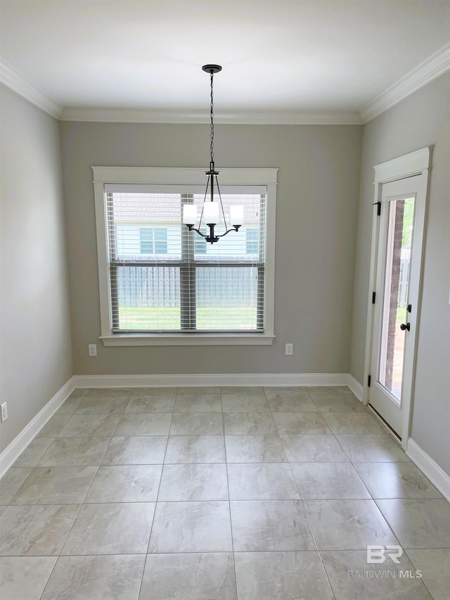 unfurnished dining area with a chandelier, ornamental molding, and baseboards