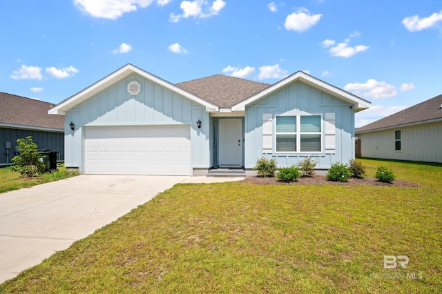 view of front facade with a front lawn and a garage