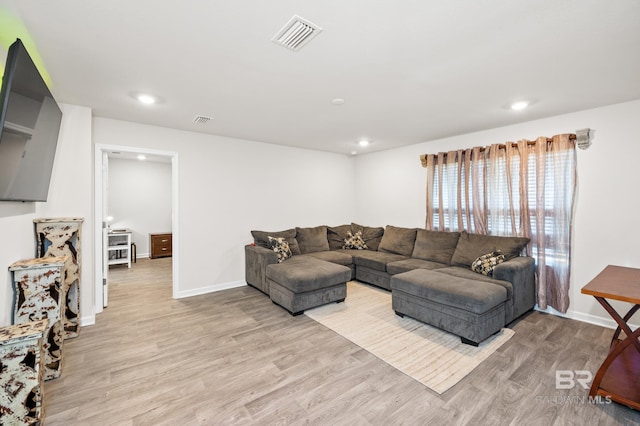 living room featuring light wood-type flooring