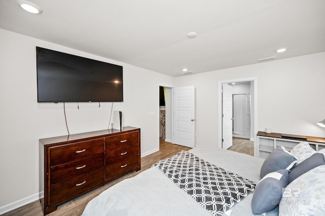 bedroom with light wood-type flooring