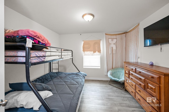 bedroom with light hardwood / wood-style floors