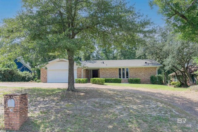 ranch-style home with a garage