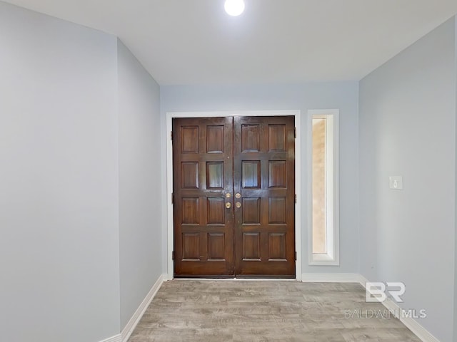 foyer featuring light wood-type flooring