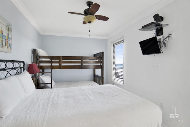 bedroom featuring ceiling fan and ornamental molding