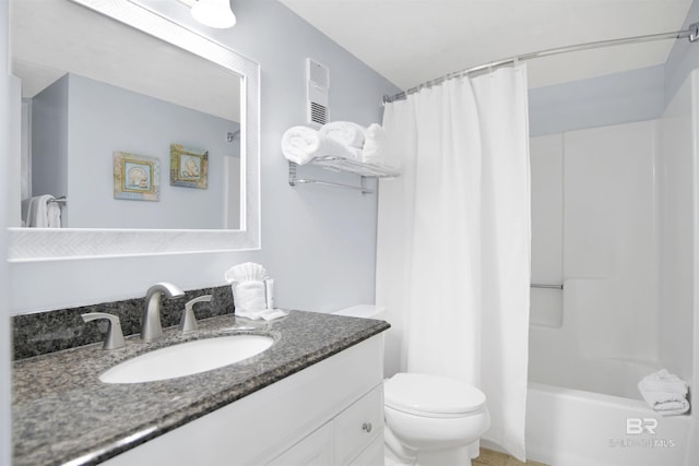 bathroom with visible vents, shower / bath combo with shower curtain, toilet, and vanity