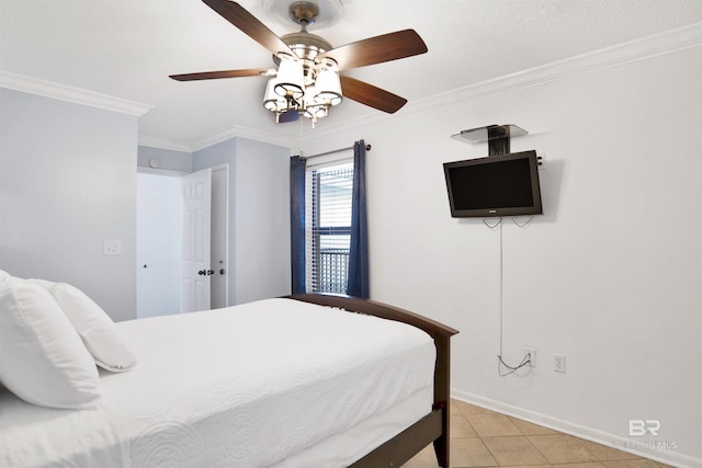 bedroom featuring ceiling fan, baseboards, ornamental molding, and light tile patterned flooring