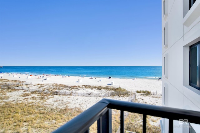 property view of water featuring a beach view