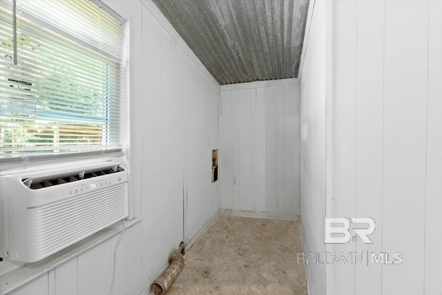 bathroom featuring cooling unit and concrete flooring