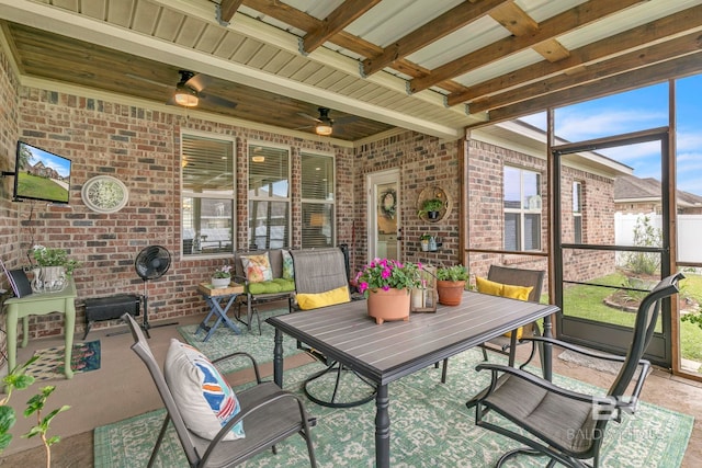 sunroom / solarium with ceiling fan