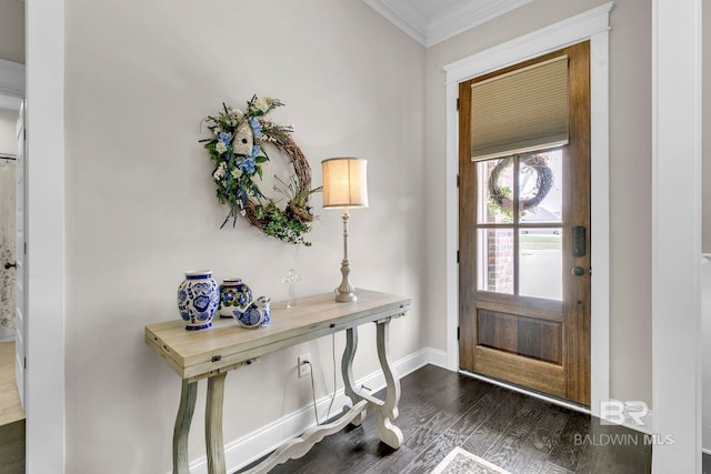 entryway featuring baseboards, ornamental molding, and dark wood finished floors