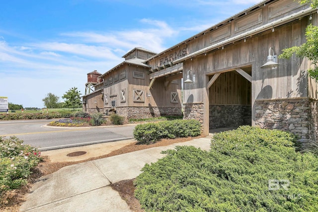 view of building exterior featuring an attached garage