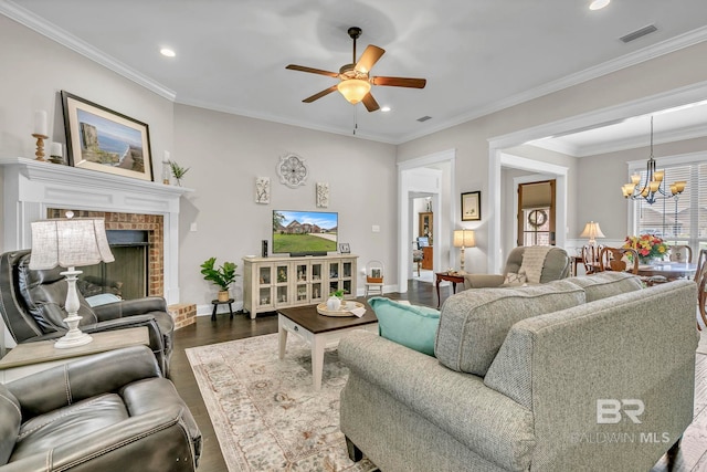 living room featuring recessed lighting, visible vents, dark wood finished floors, and ceiling fan with notable chandelier