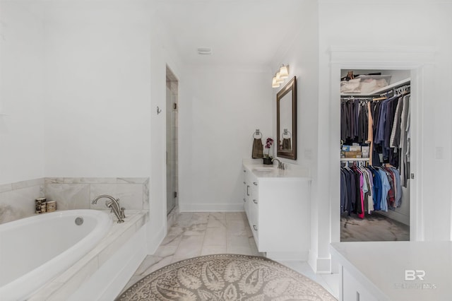 bathroom featuring vanity and shower with separate bathtub