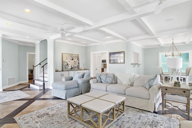 1219 Parasol Pl, Perdido Key, FL 32507 - living room featuring baseboards, beamed ceiling, coffered ceiling, stairs, and a ceiling fan