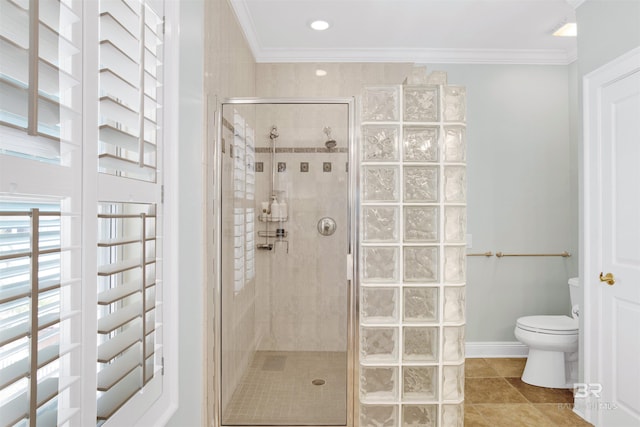 1219 Parasol Pl, Perdido Key, FL 32507 - full bathroom with crown molding, a shower stall, toilet, tile patterned floors, and recessed lighting