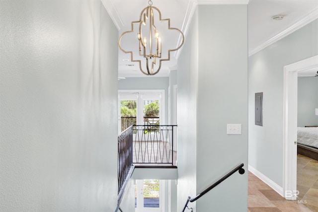 1219 Parasol Pl, Perdido Key, FL 32507 - hall featuring an upstairs landing, a chandelier, ornamental molding, baseboards, and electric panel