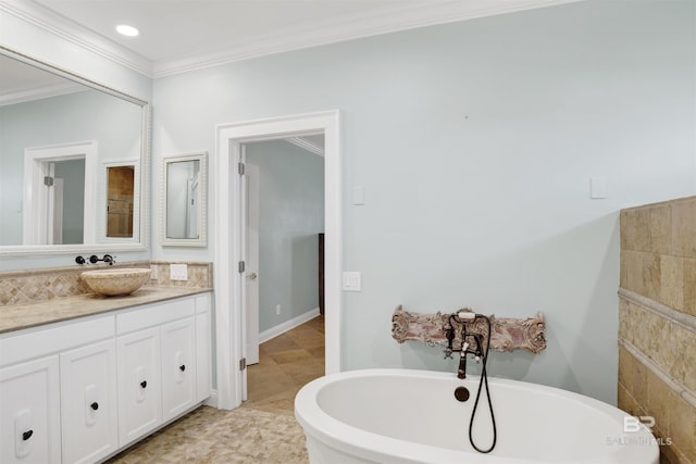 1219 Parasol Pl, Perdido Key, FL 32507 - full bathroom featuring crown molding, a freestanding bath, and vanity