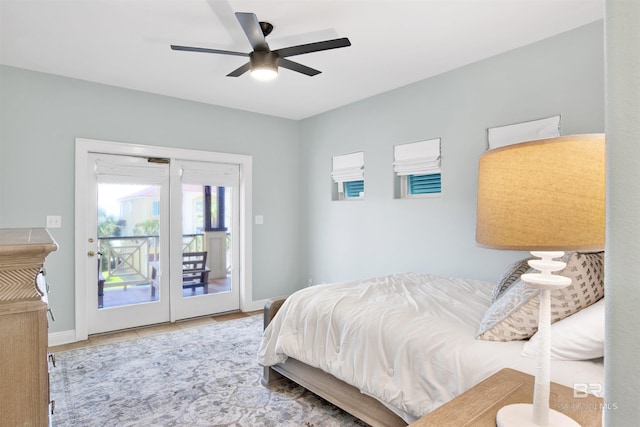 1219 Parasol Pl, Perdido Key, FL 32507 - bedroom featuring access to exterior, baseboards, and ceiling fan