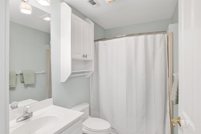 1219 Parasol Pl, Perdido Key, FL 32507 - bathroom featuring vanity, toilet, and a shower with curtain