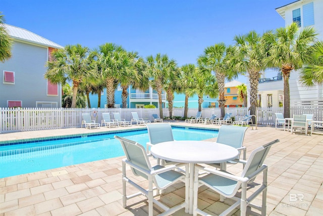1219 Parasol Pl, Perdido Key, FL 32507 - community pool featuring a patio area and outdoor dining area