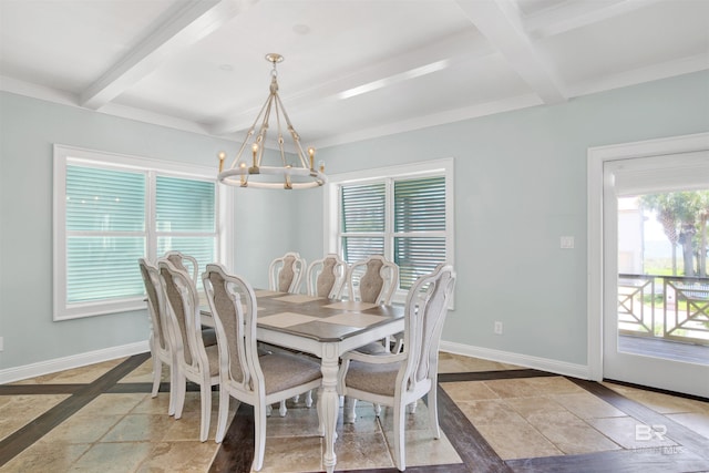 1219 Parasol Pl, Perdido Key, FL 32507 - dining room with beam ceiling, a chandelier, inlaid floor details, baseboards, and stone tile flooring