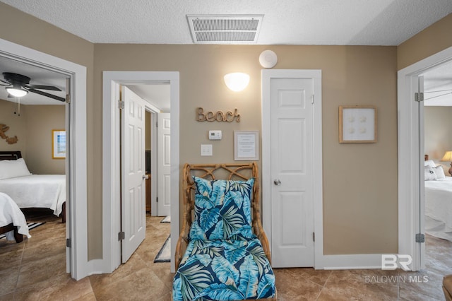 bedroom with a textured ceiling