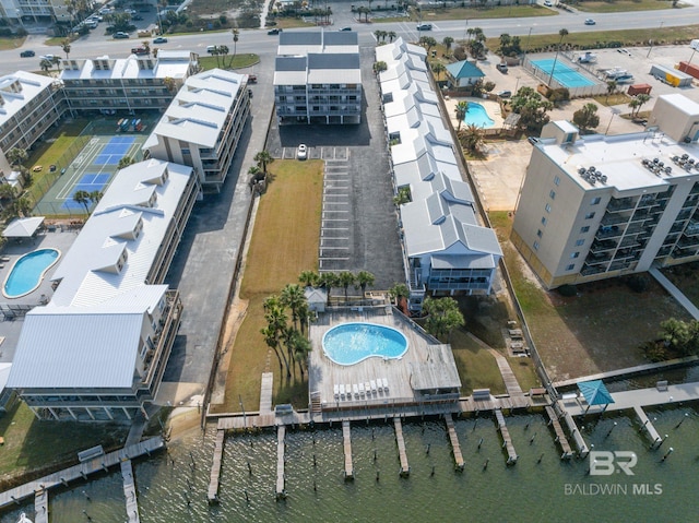 birds eye view of property featuring a water view