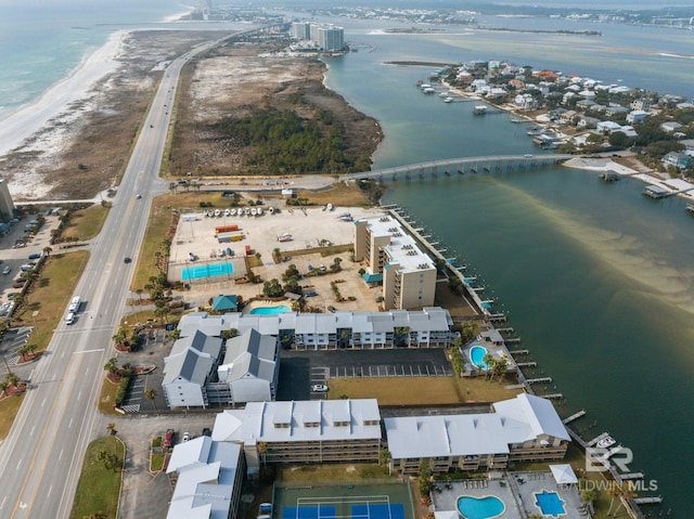 aerial view with a view of the beach and a water view