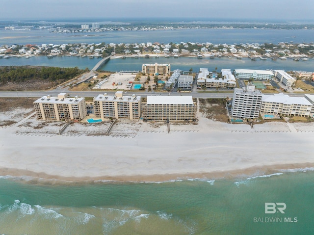 aerial view featuring a water view and a view of the beach