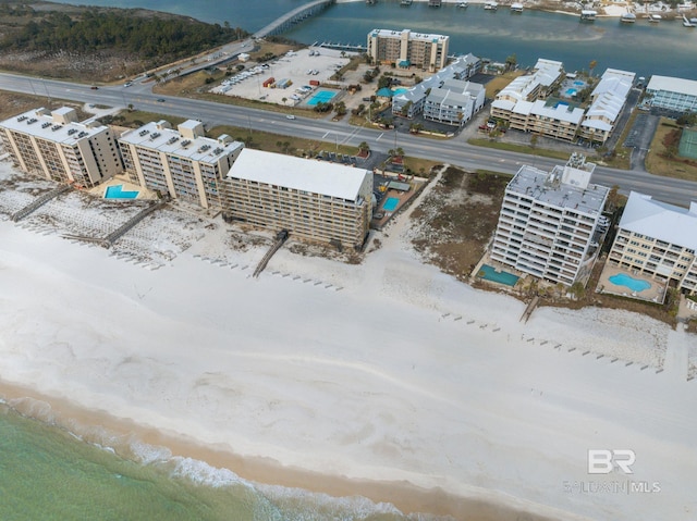 bird's eye view with a water view