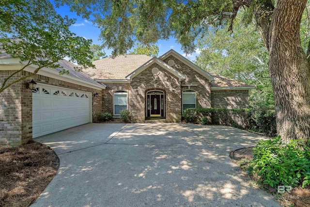 view of front of house with a garage