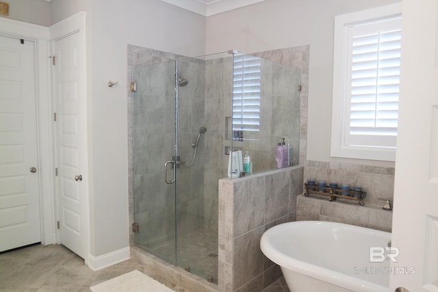 bathroom featuring separate shower and tub and tile patterned flooring